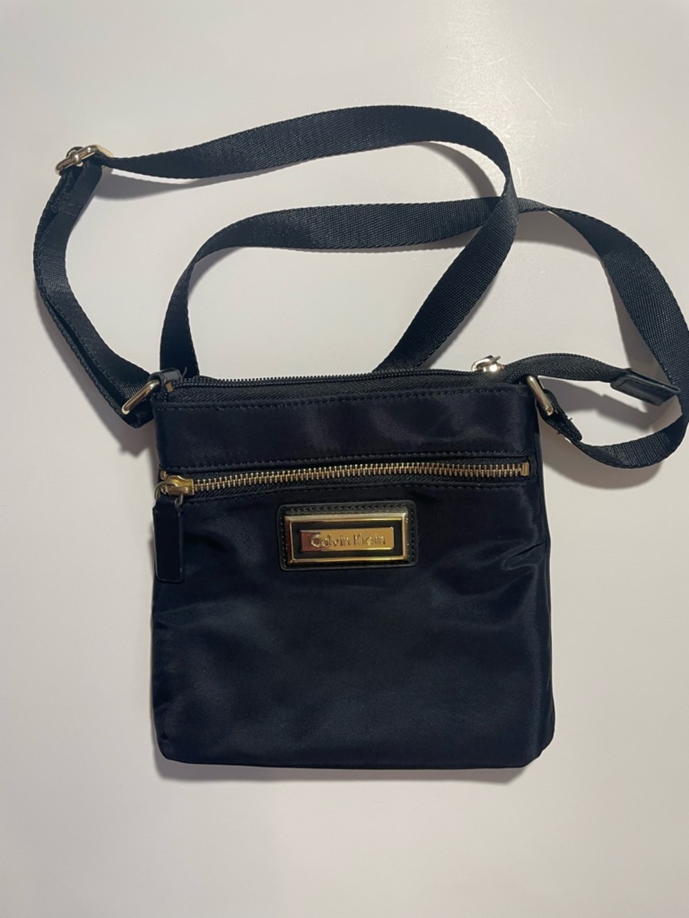 Calvin Klein Black Crossbody Pouch with Gold Accent